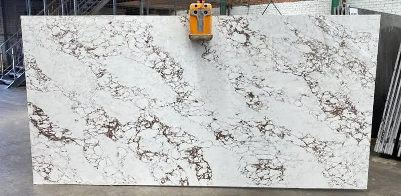 Close-up of a white worktop with dramatic veining