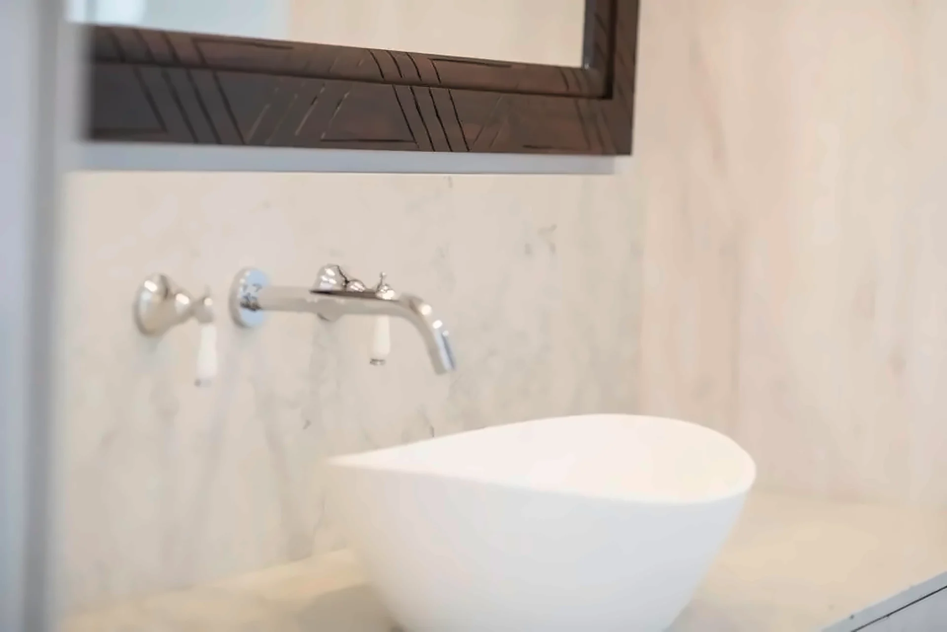 Timber vanity, framed mirror: Wall-mounted tap and basin